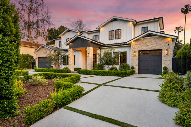 Buy a house in a charming neighborhood with stunning sidewalk landscaping.